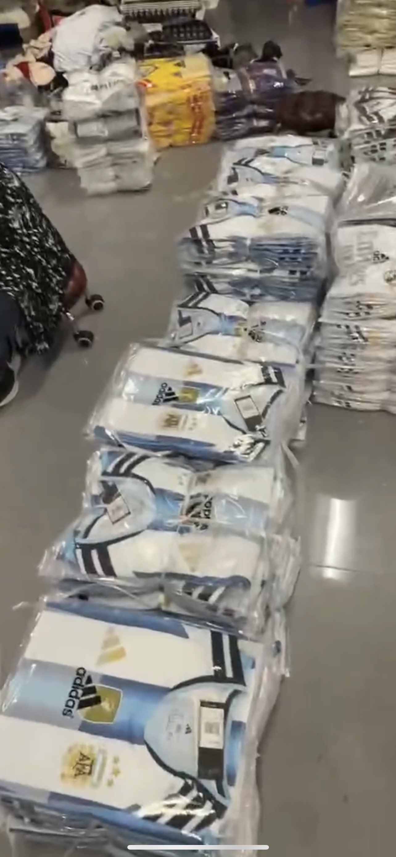 Argentina jerseys packed on the warehouse floor